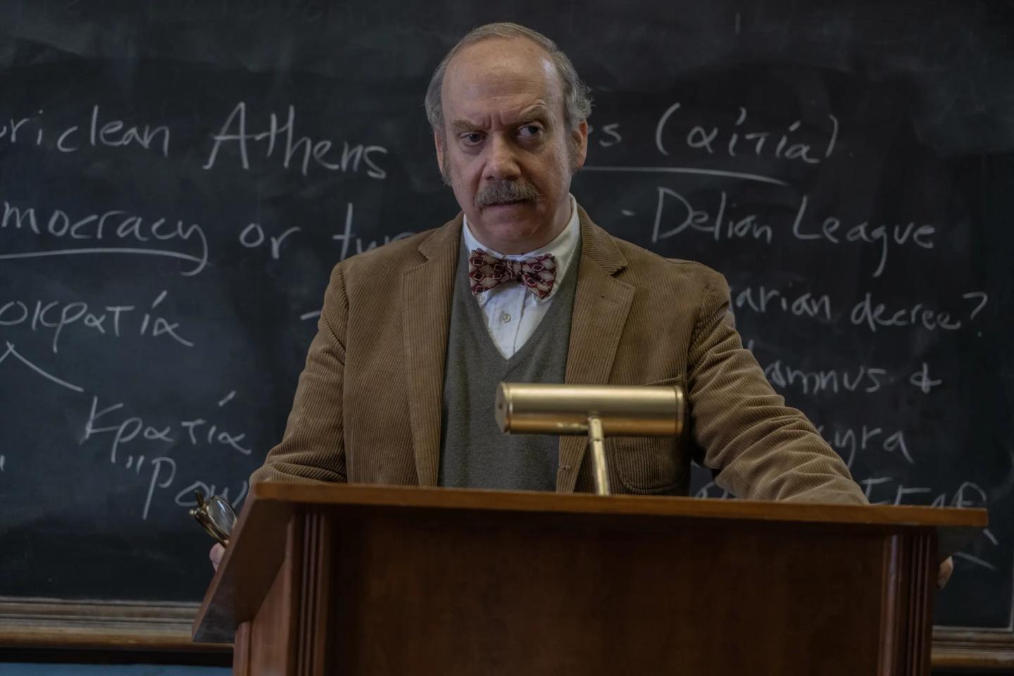 a man standing at a podium