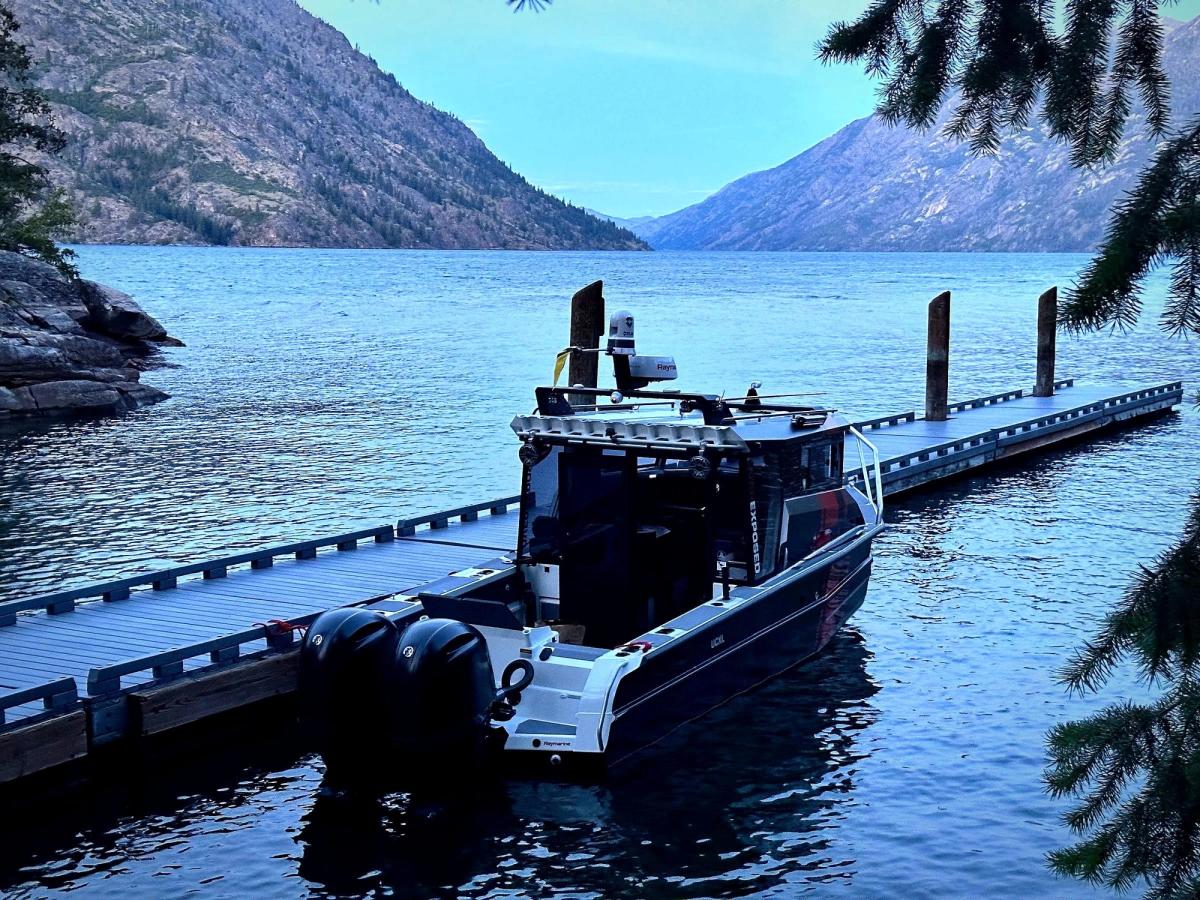 Our boat moored at a dock on deep blue water