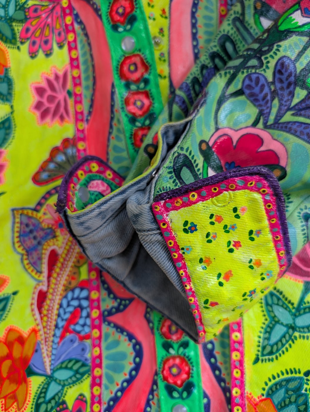 Painted denim jacket cuff and sleeve detail
