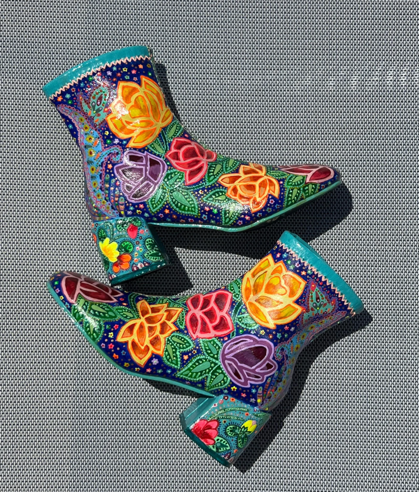 Hand-painted boots with colorful decorative patterns