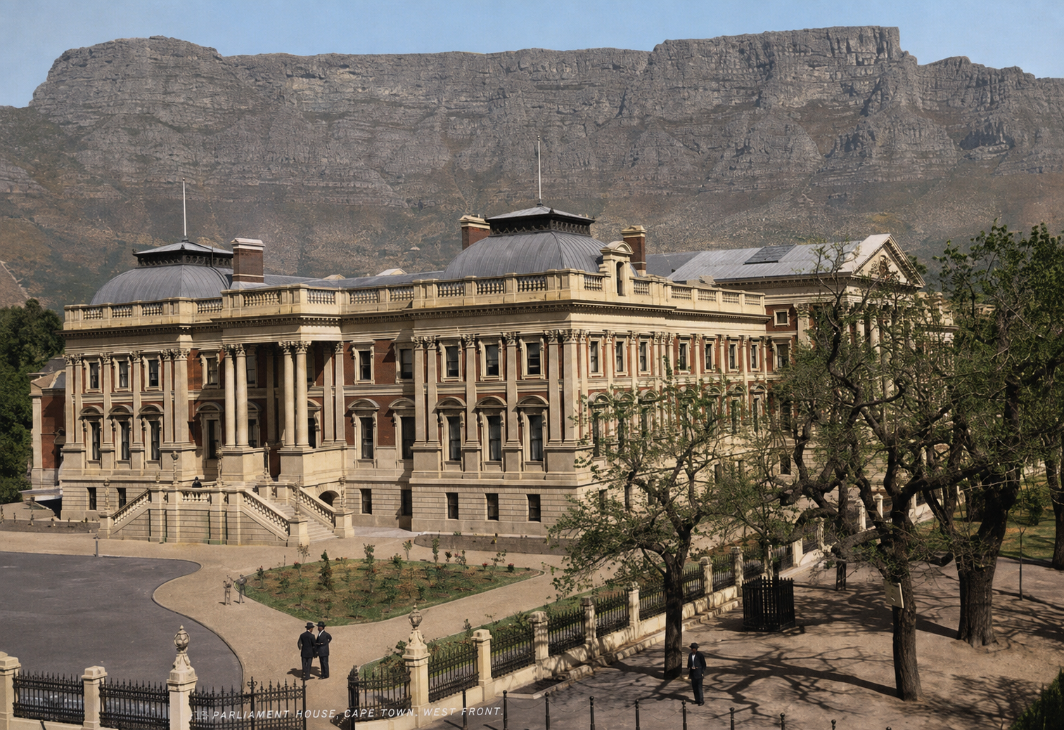 Parliament House in Cape Town seen from the west, Table Mountain rising behind it, in a photograph from around 1890.