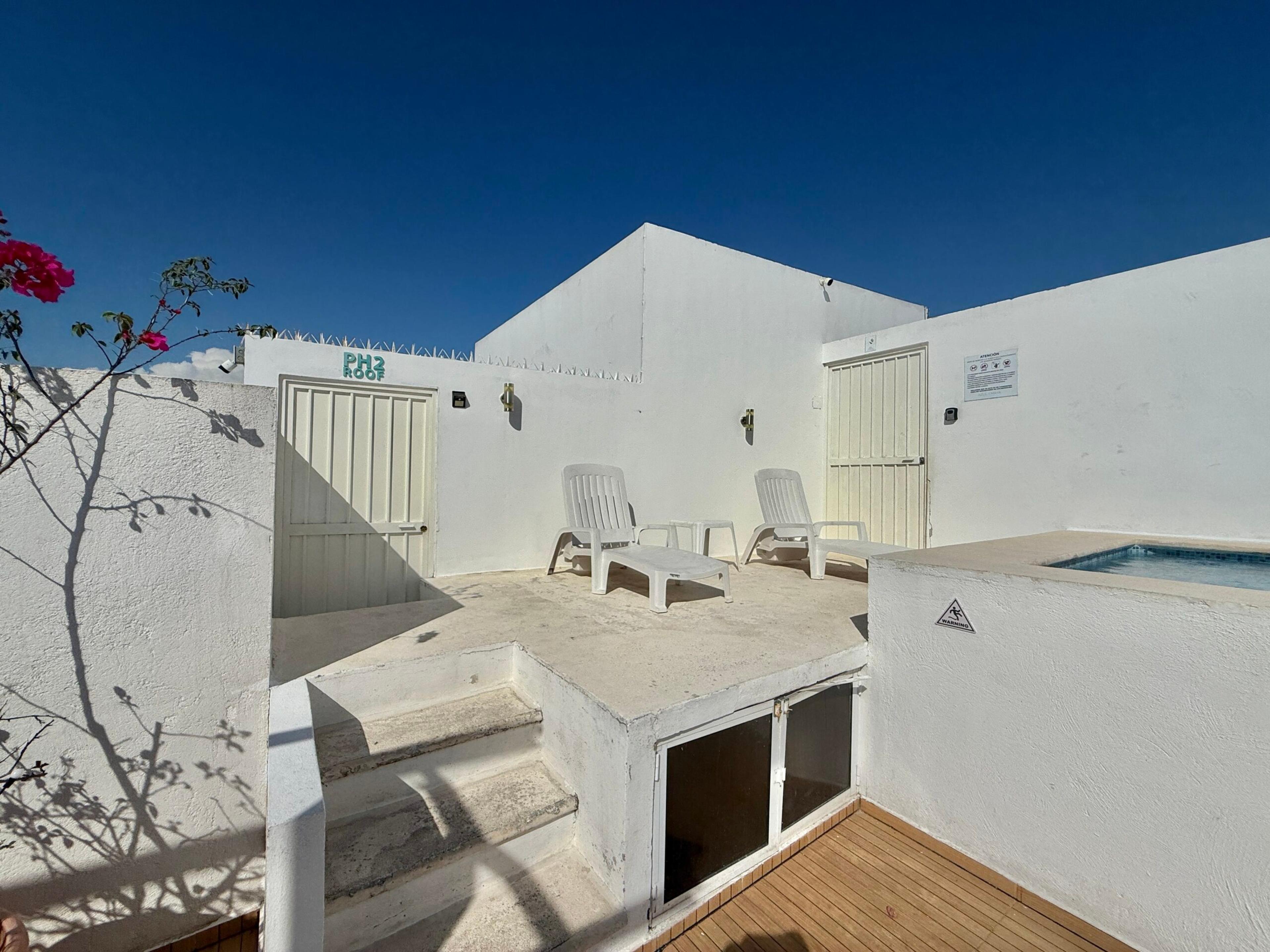 Azul Maya | Bright 2-Bedroom Condo with Rooftop Pool — photo 19