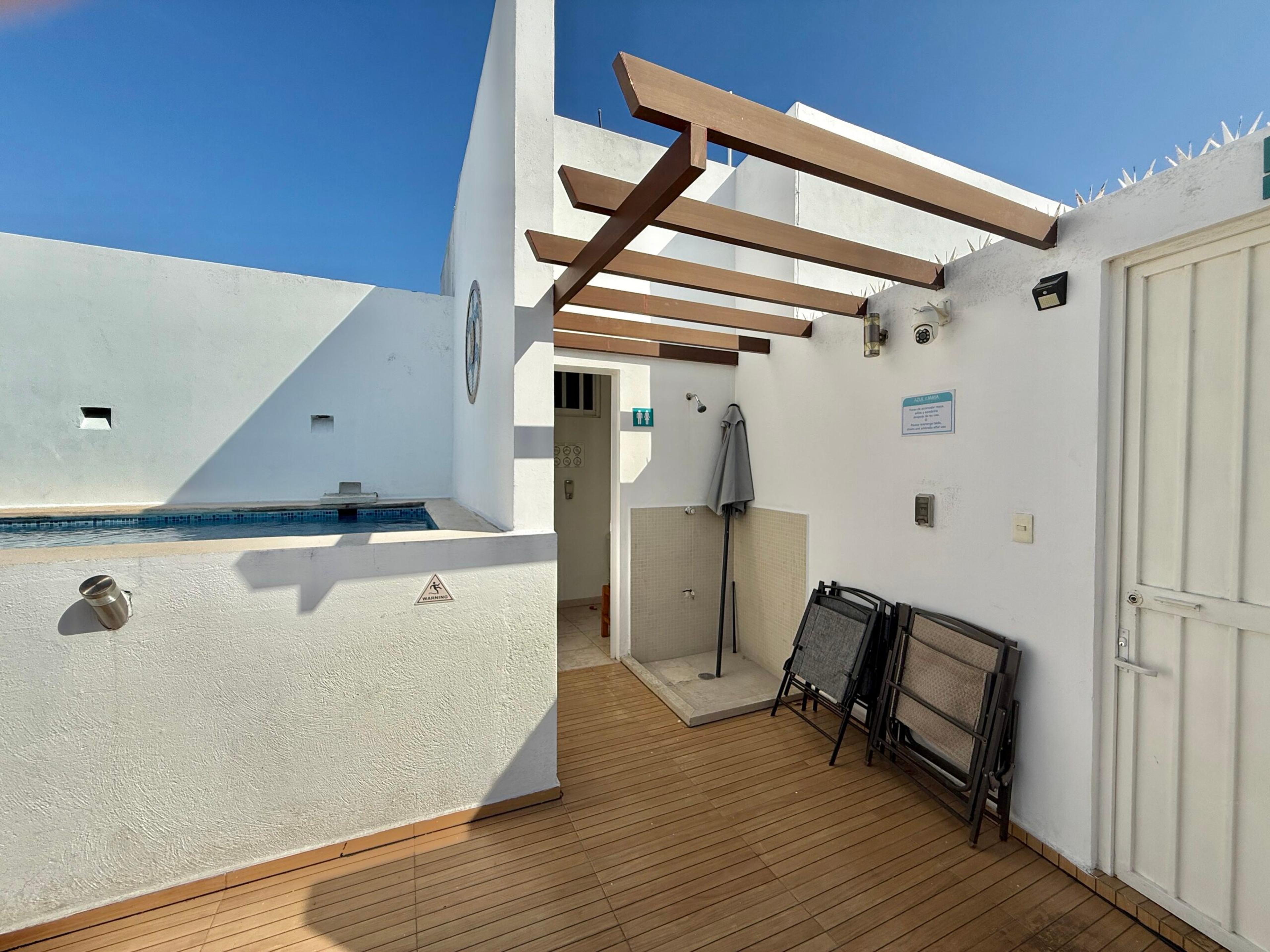 Azul Maya | Bright 2-Bedroom Condo with Rooftop Pool — photo 22