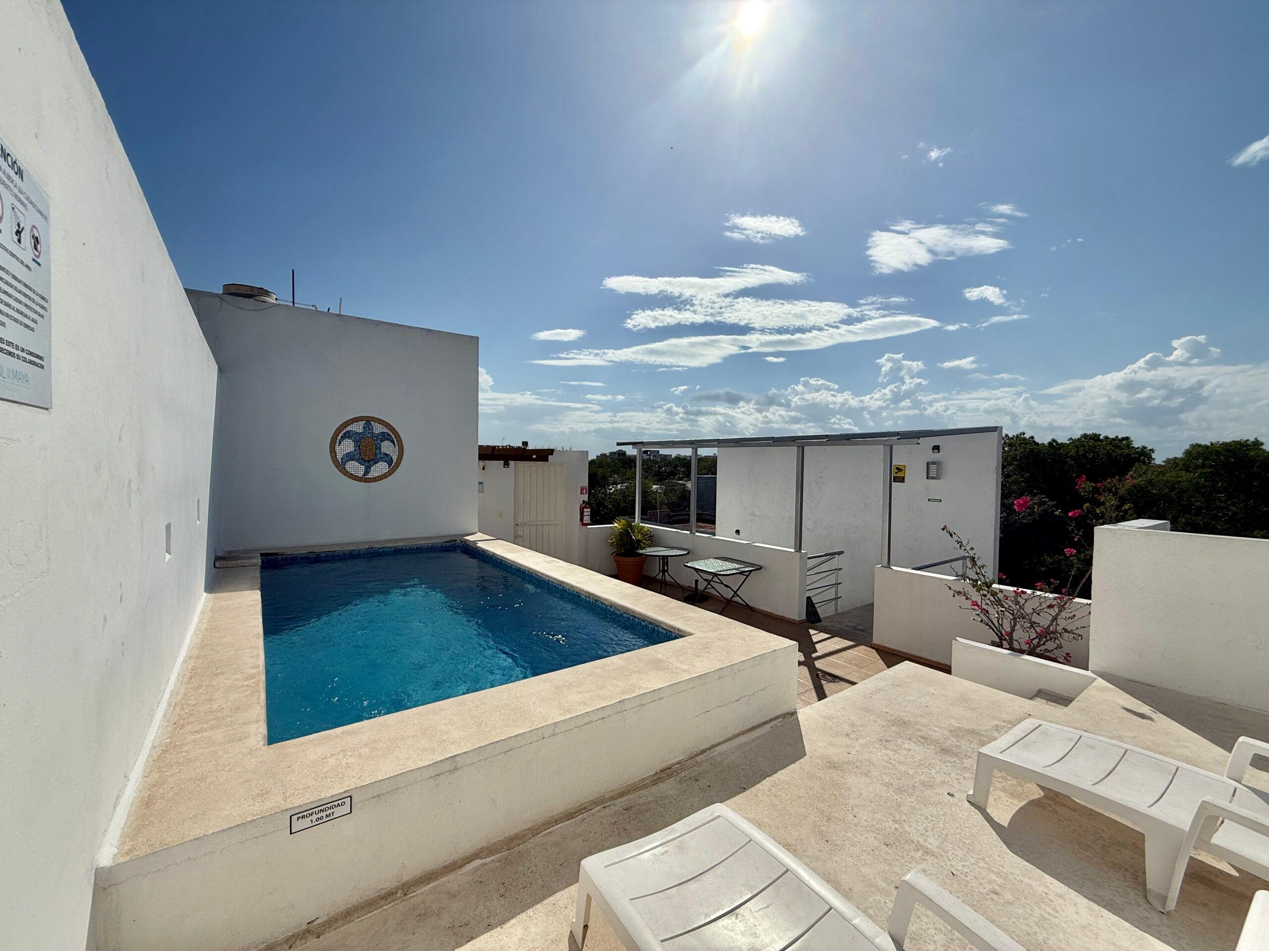 Azul Maya | Bright 2-Bedroom Condo with Rooftop Pool — photo 21