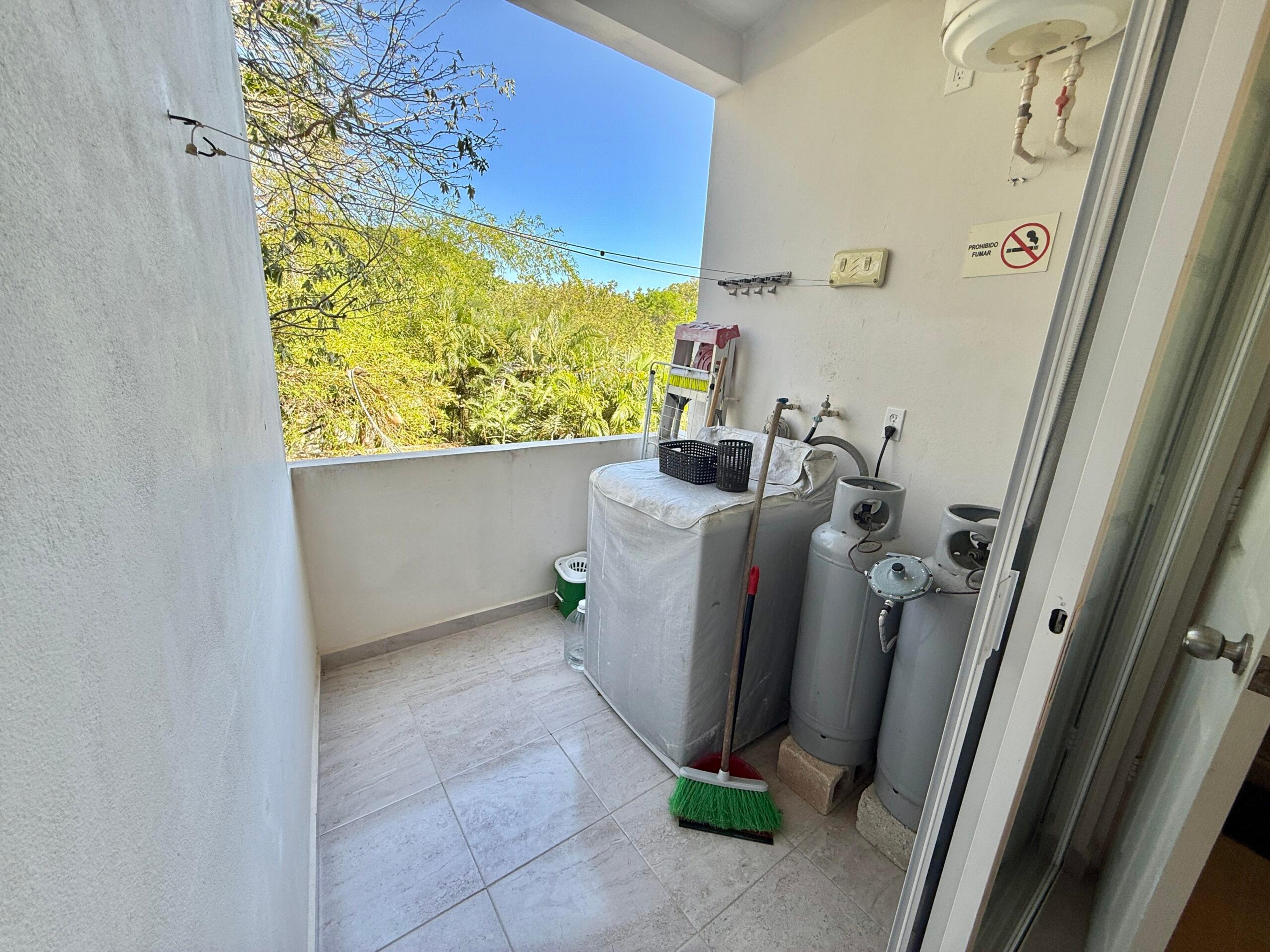 Azul Maya | Bright 2-Bedroom Condo with Rooftop Pool — photo 18