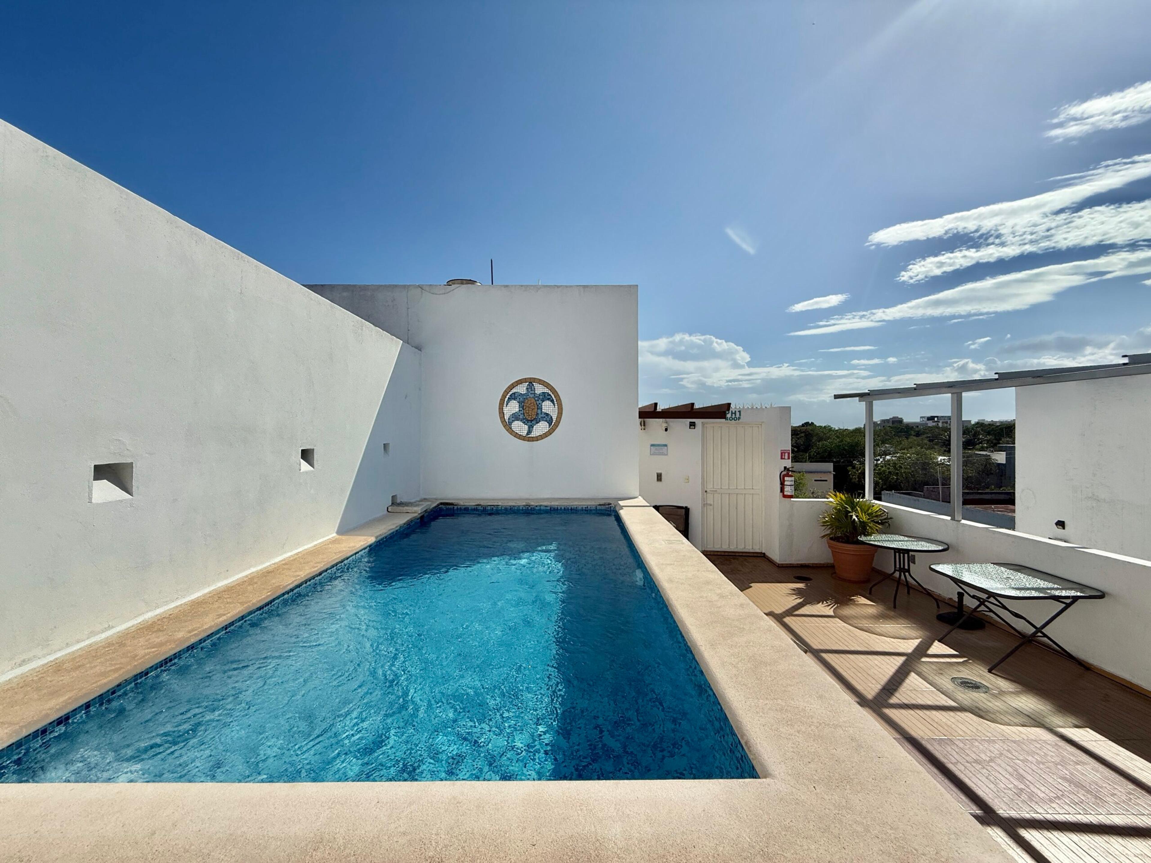Azul Maya | Bright 2-Bedroom Condo with Rooftop Pool — photo 3
