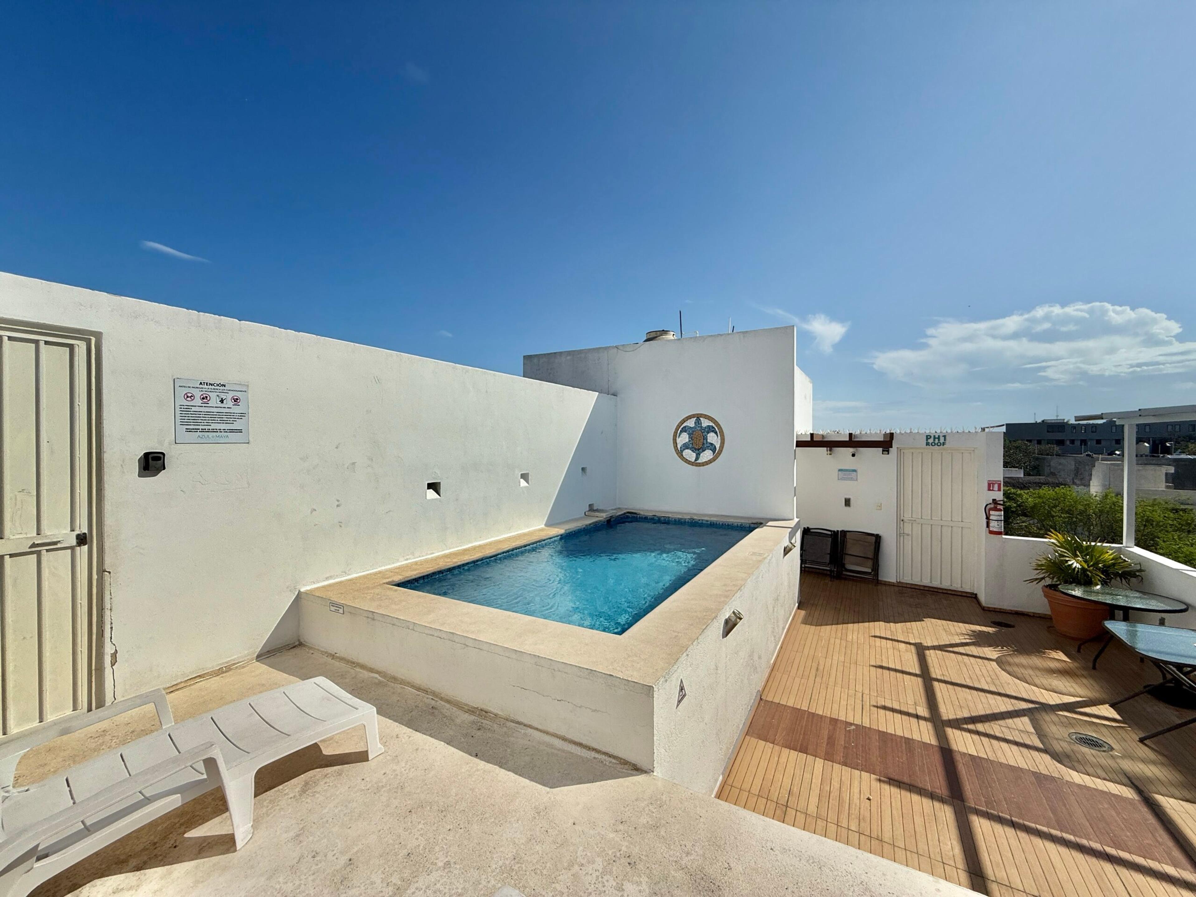 Azul Maya | Bright 2-Bedroom Condo with Rooftop Pool — photo 20