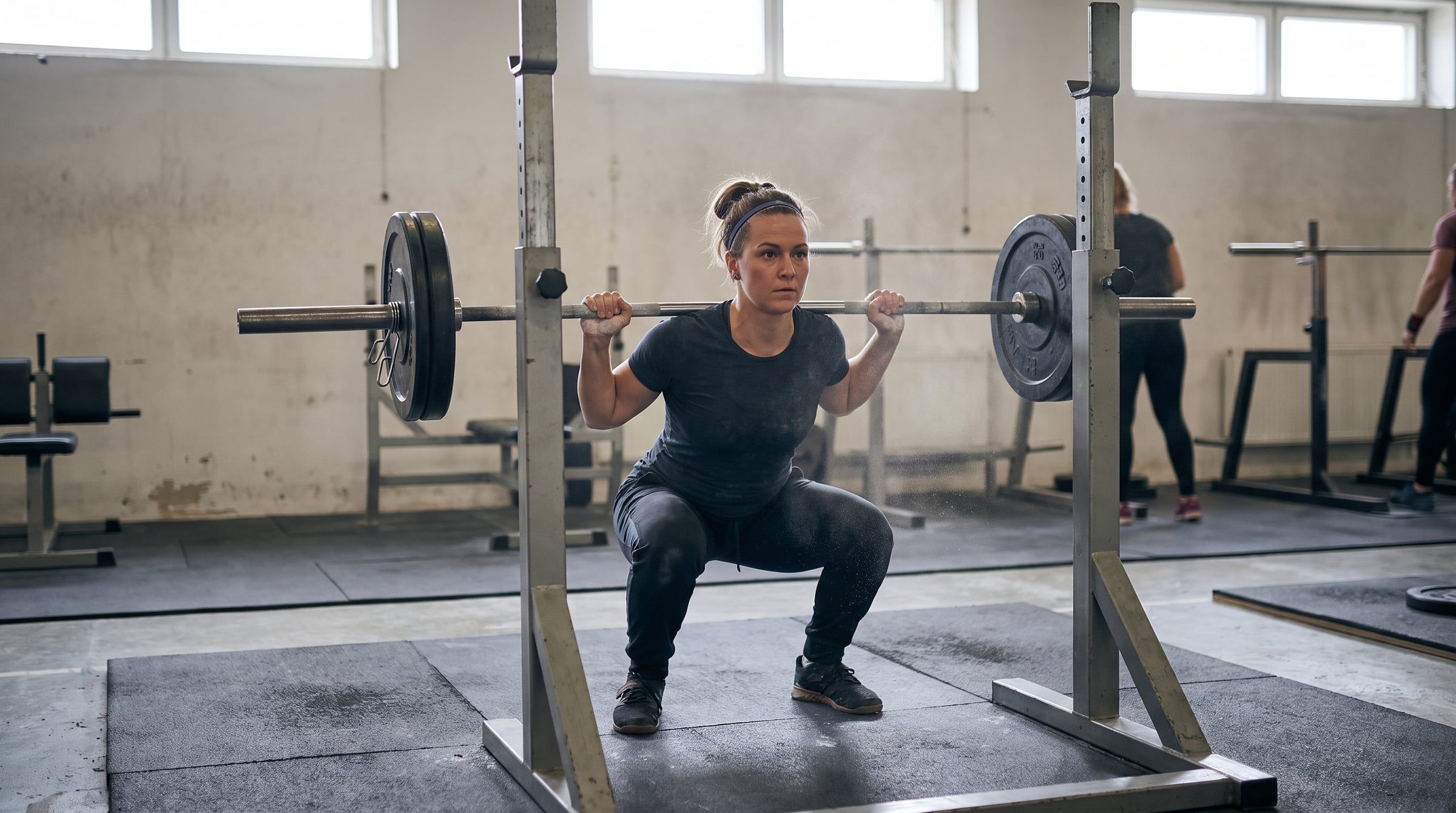 Adult in their 40s or 50s performing resistance training