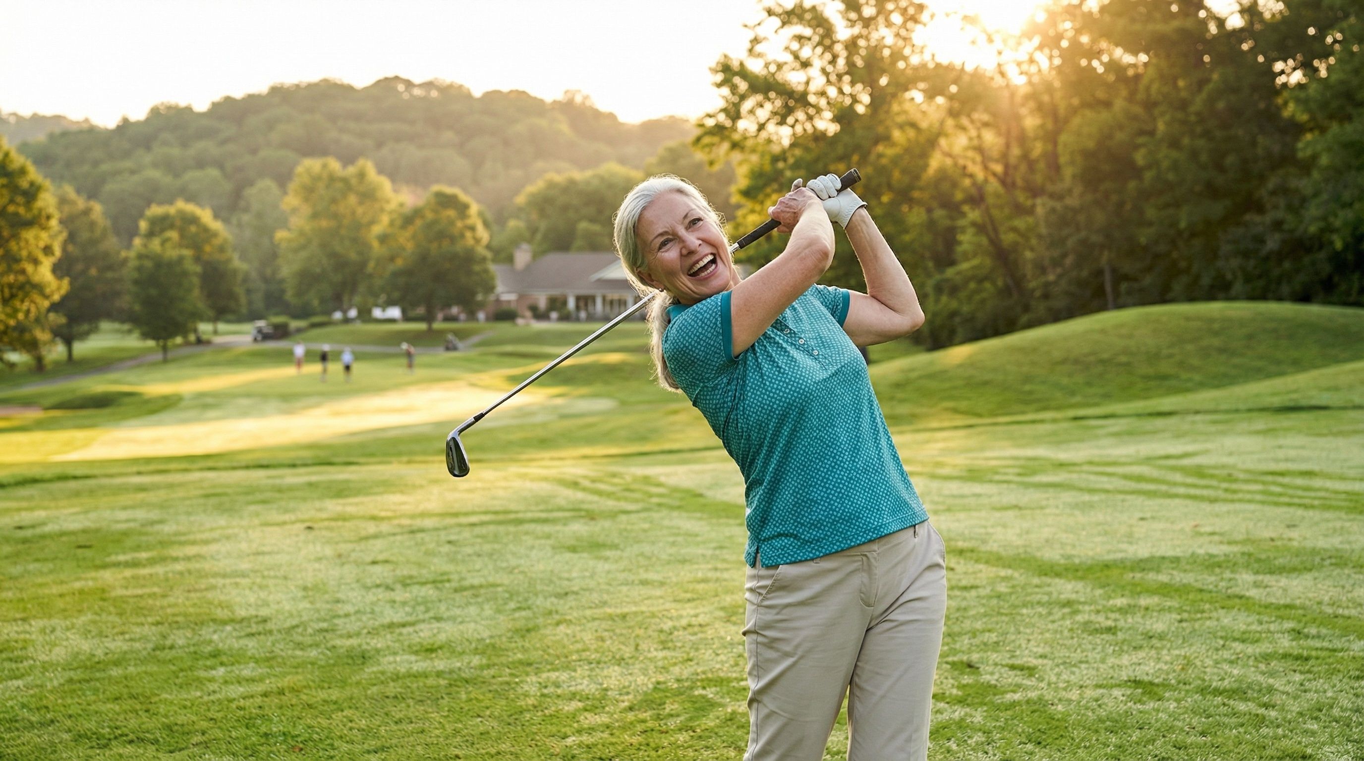 Older adult playing golf with full hip mobility
