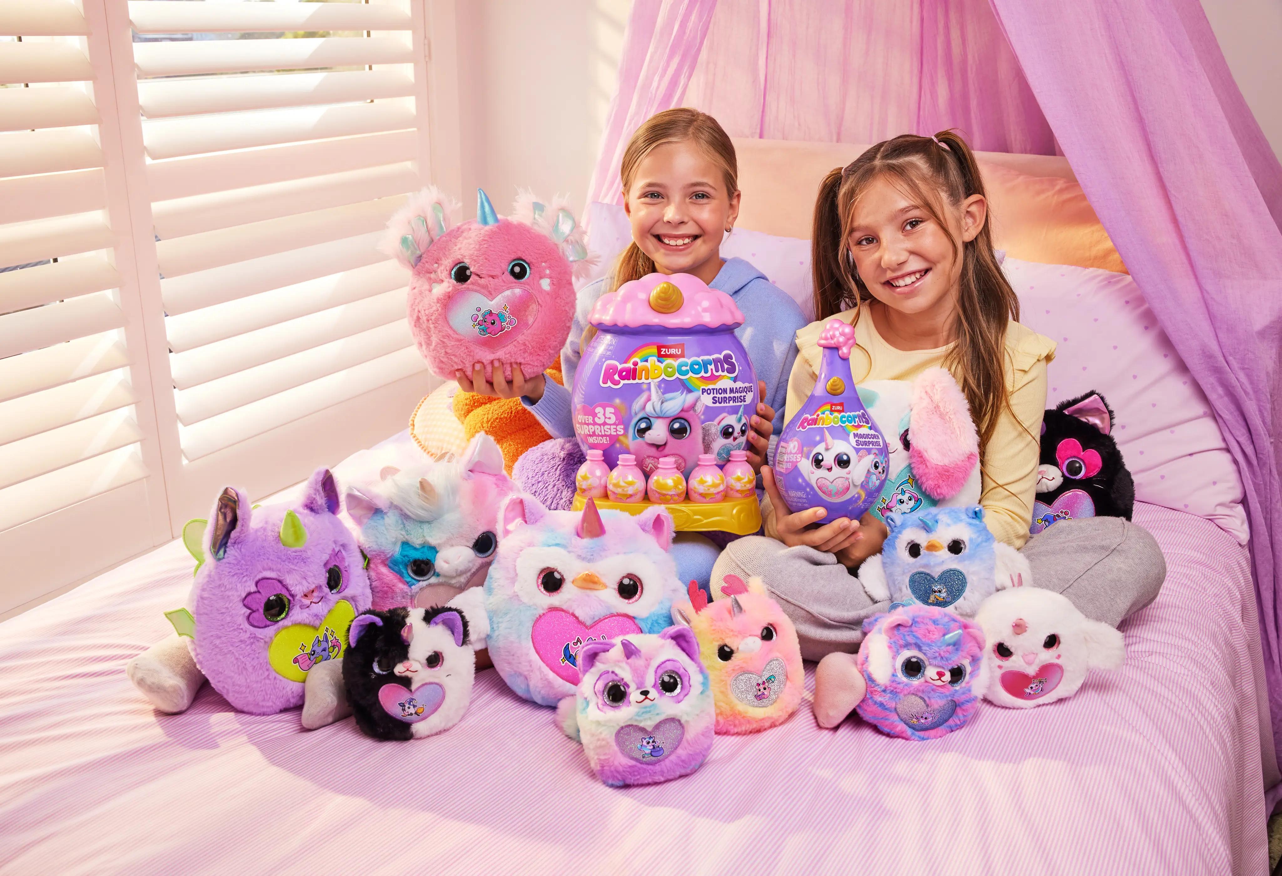 Holding fluffy purple Rainbocorns