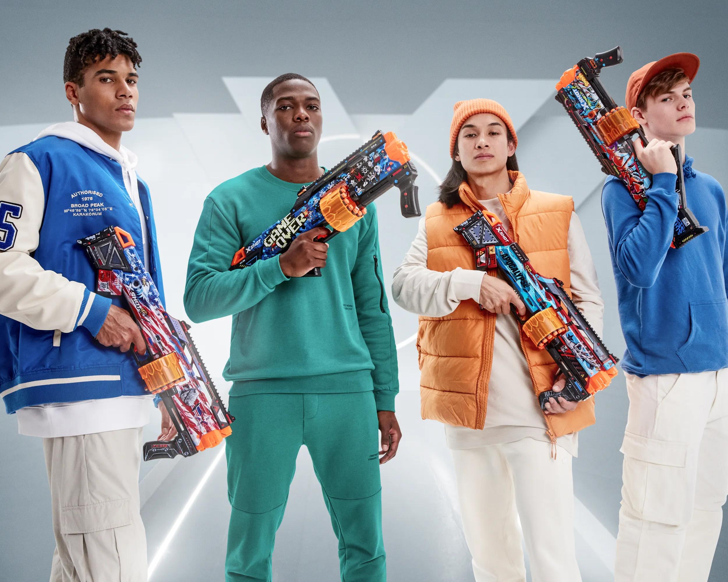 Lineup of people holding XSHOT Blasters