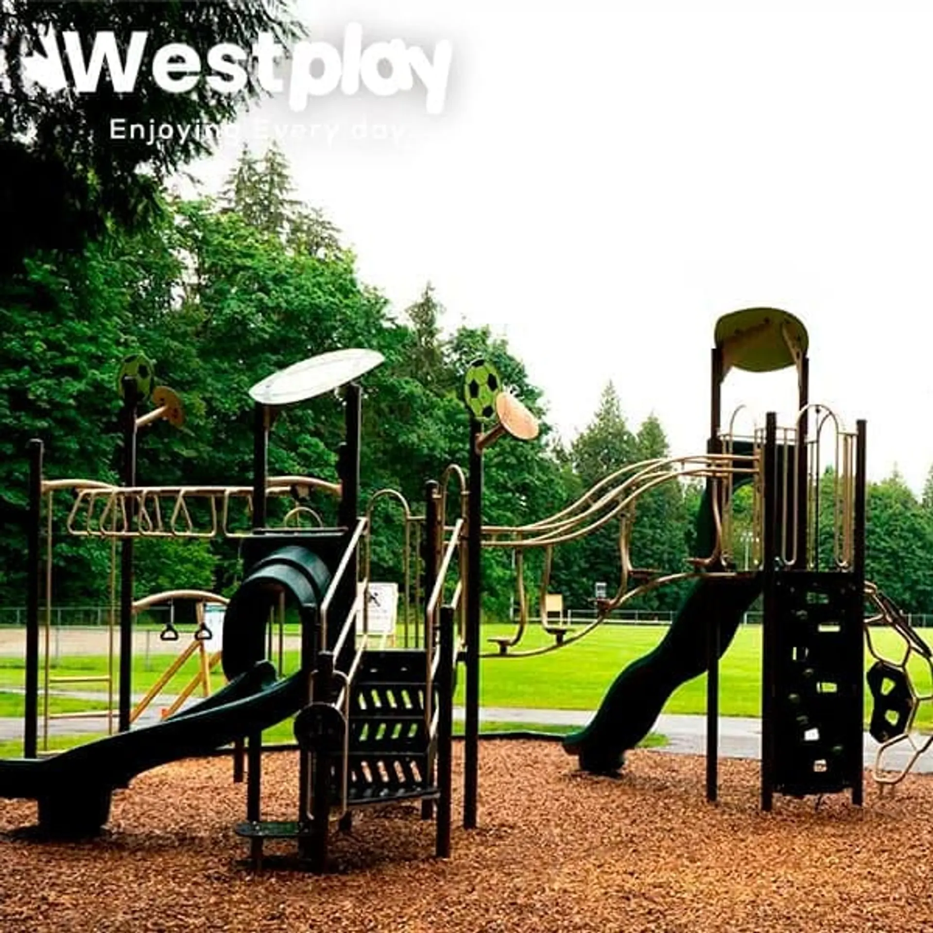 Completed municipal park with play structure and safety surfacing