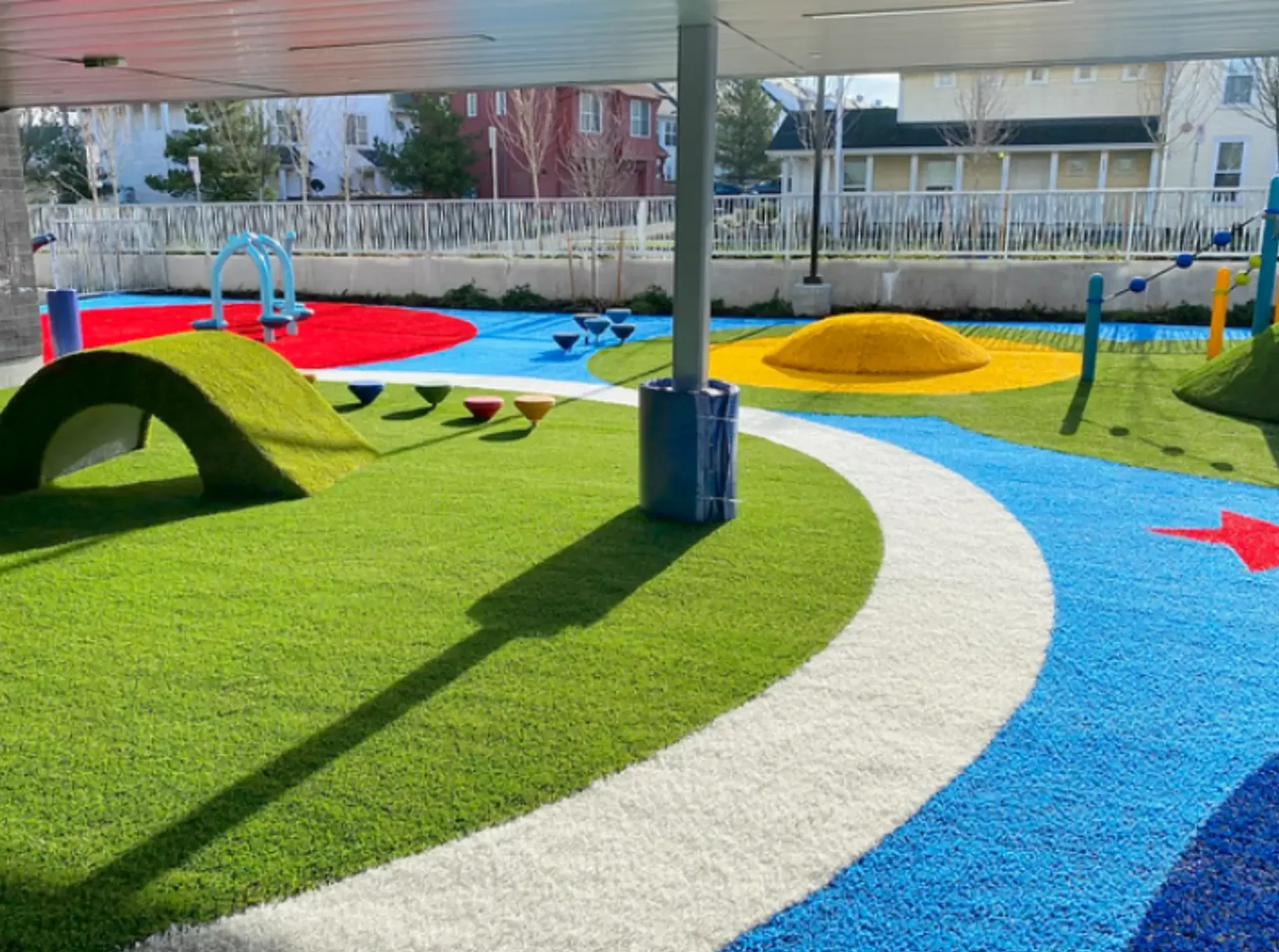 Synthetic playground grass surfacing installed by Westplay
