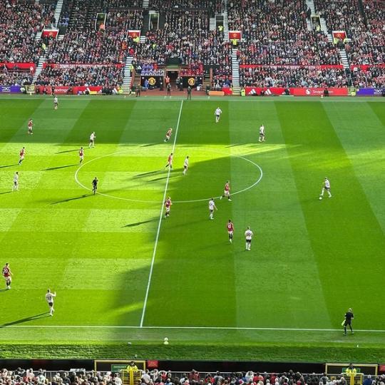 Manchester United playing at Old Trafford