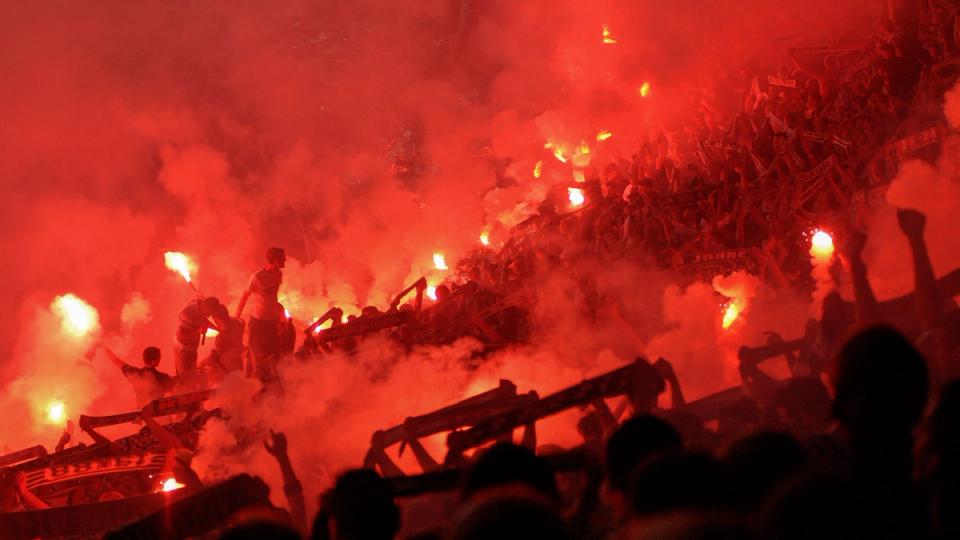 Fans showing their passion with pyro before a match