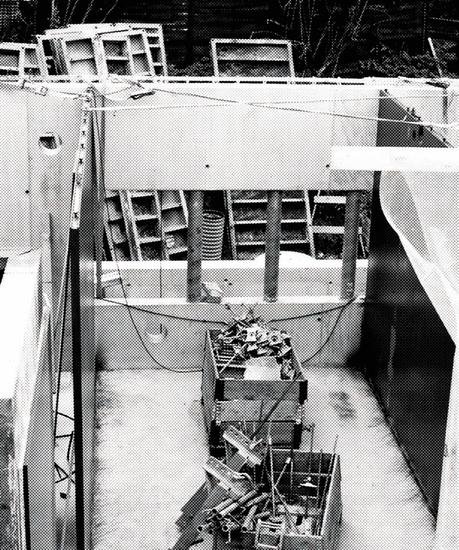 Black and white photo of construction work.