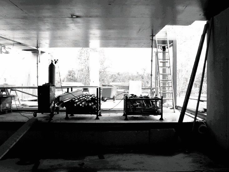 Black and white photo taken during construction