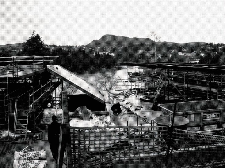 Black and white photo taken during construction. 