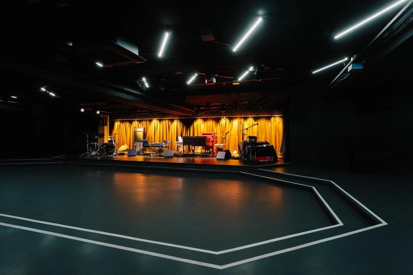 Photo of concert stage in the basement