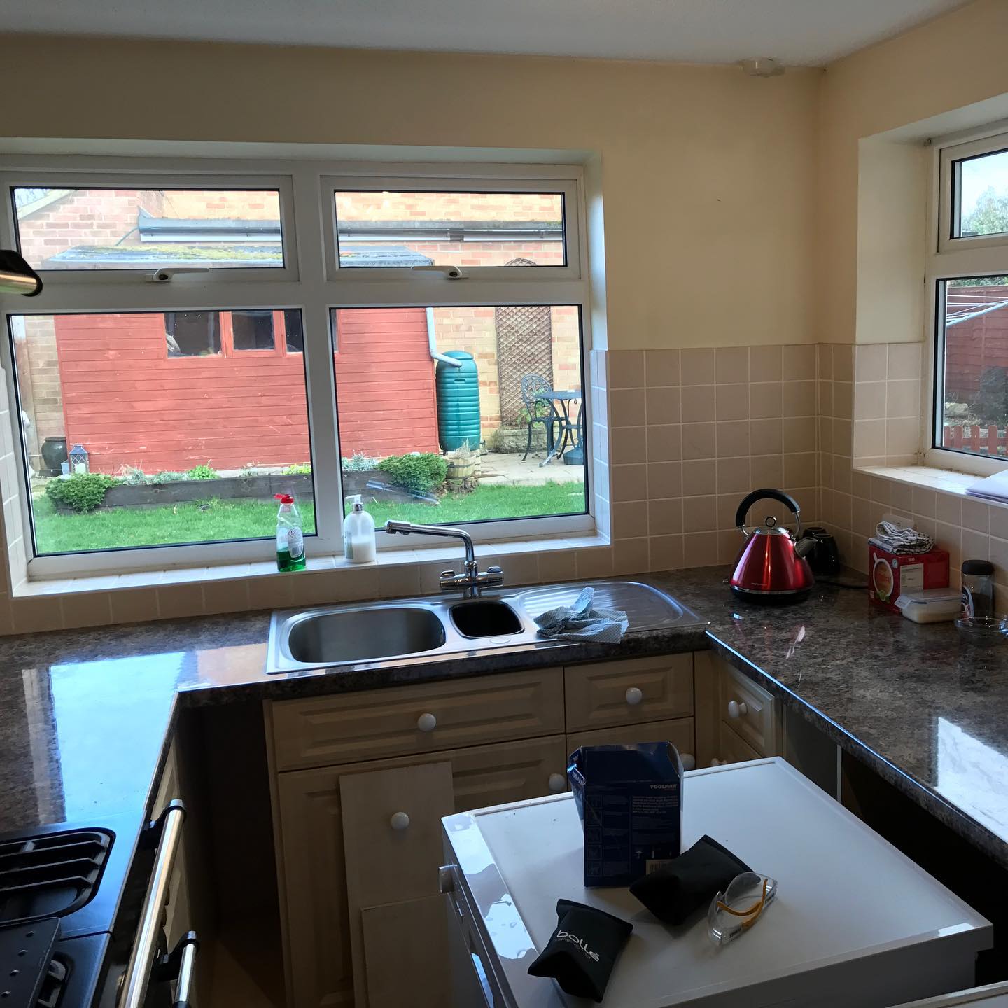 Kitchen before work begun in Wokingham