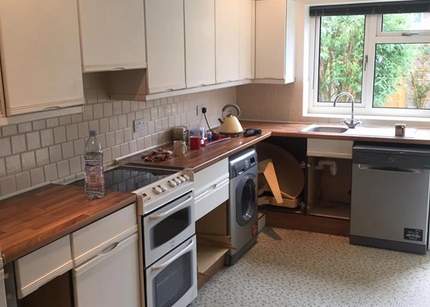 Kitchen before work begun in Tilehurst, Reading