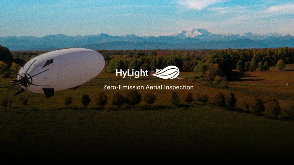 Hylight website: a white airship flying over woodland below snowy mountains, with the tagline “Zero-Emission Aerial Inspection”
