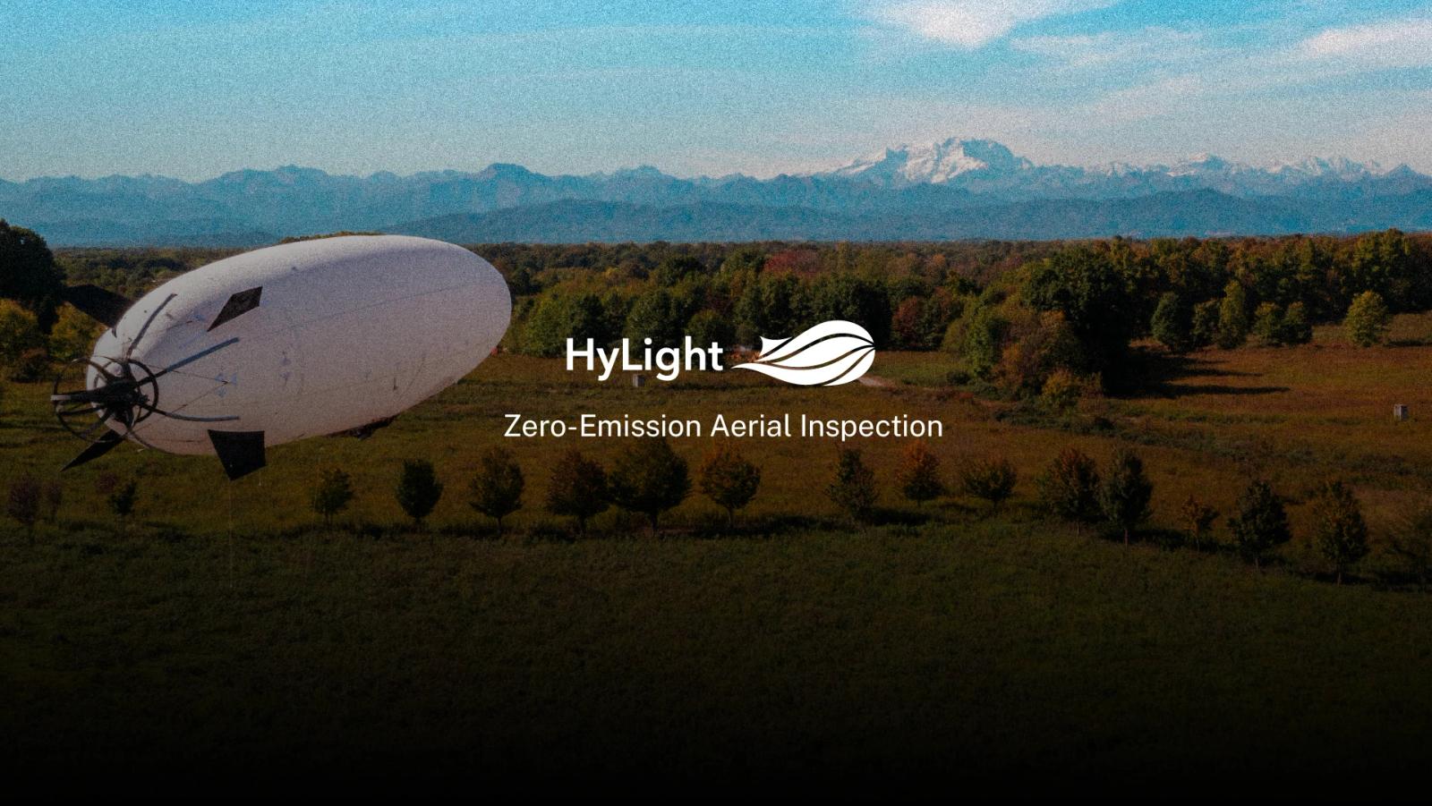 Hylight website: a white airship flying over woodland below snowy mountains, with the tagline “Zero-Emission Aerial Inspection”