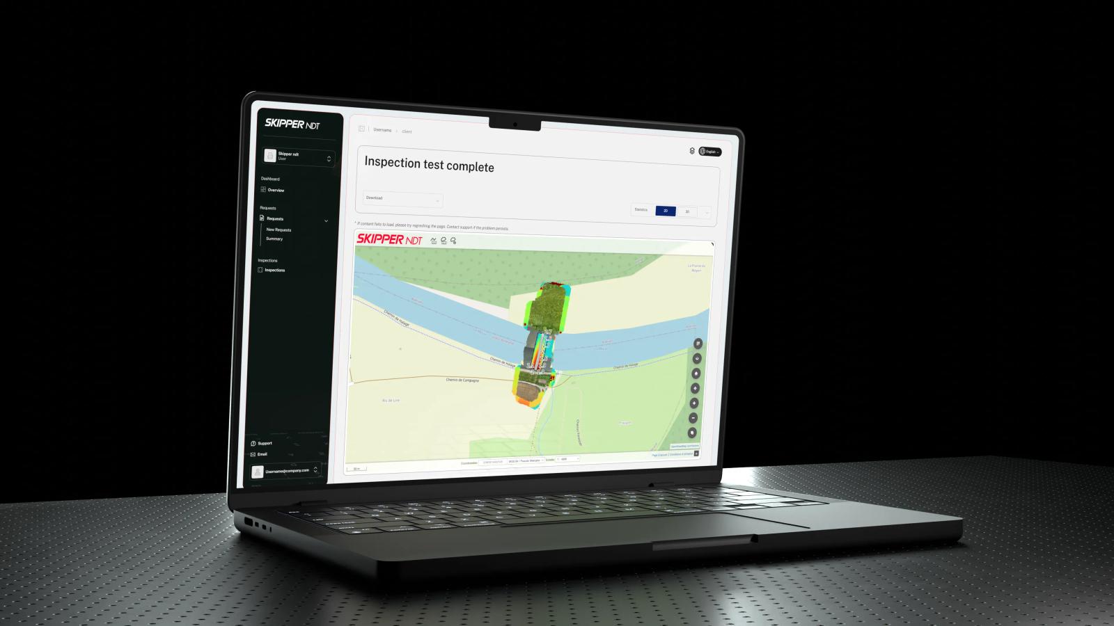 The Skipper NDT inspection app on a laptop: “Inspection test complete” above a map of a buried pipeline