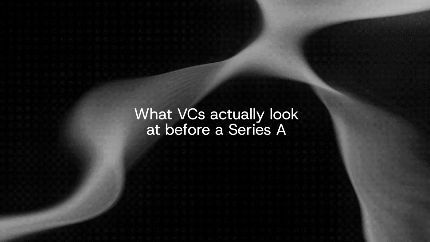 Soft white waves of light on black around the words “What VCs actually look at before a Series A”