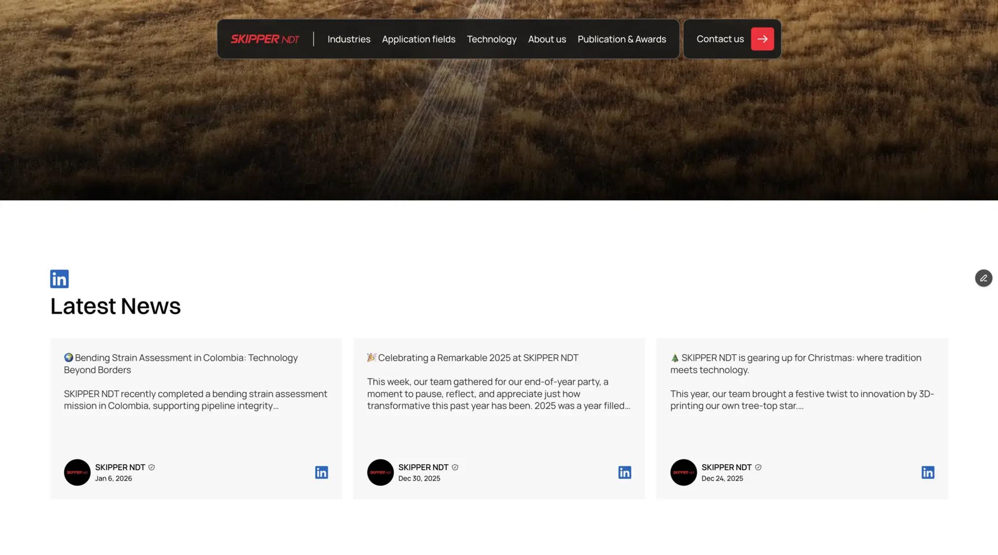 Skipper NDT website: a “Latest News” row of LinkedIn posts under an aerial shot of a dry field