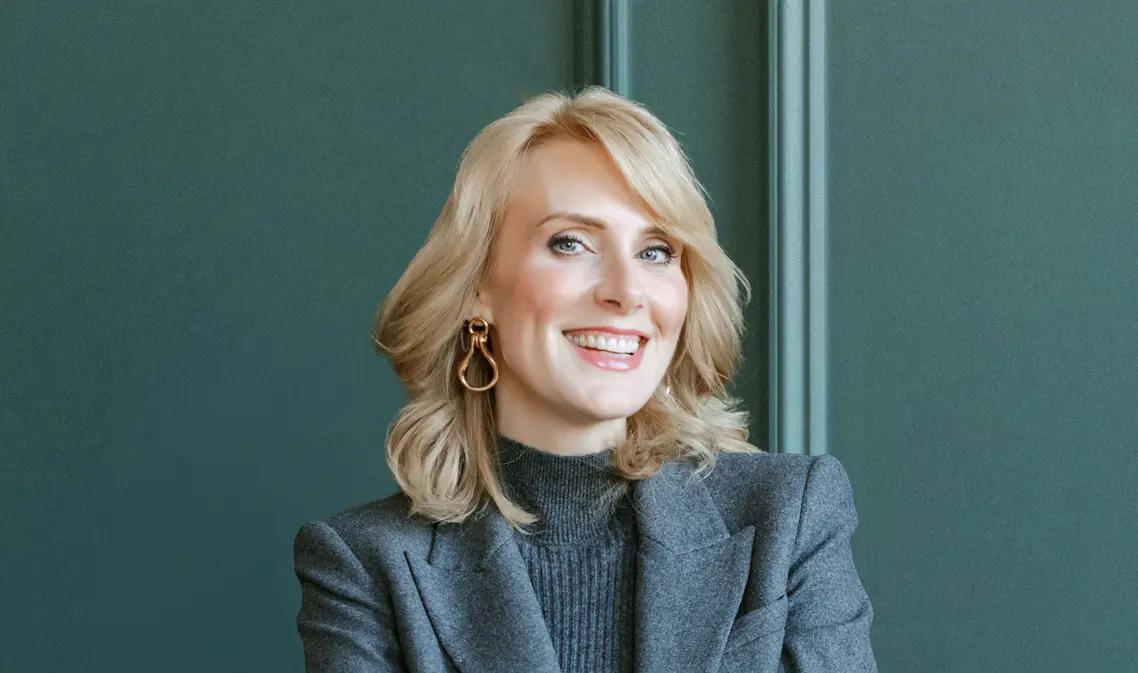 Sharon McMahon with her book in hand
