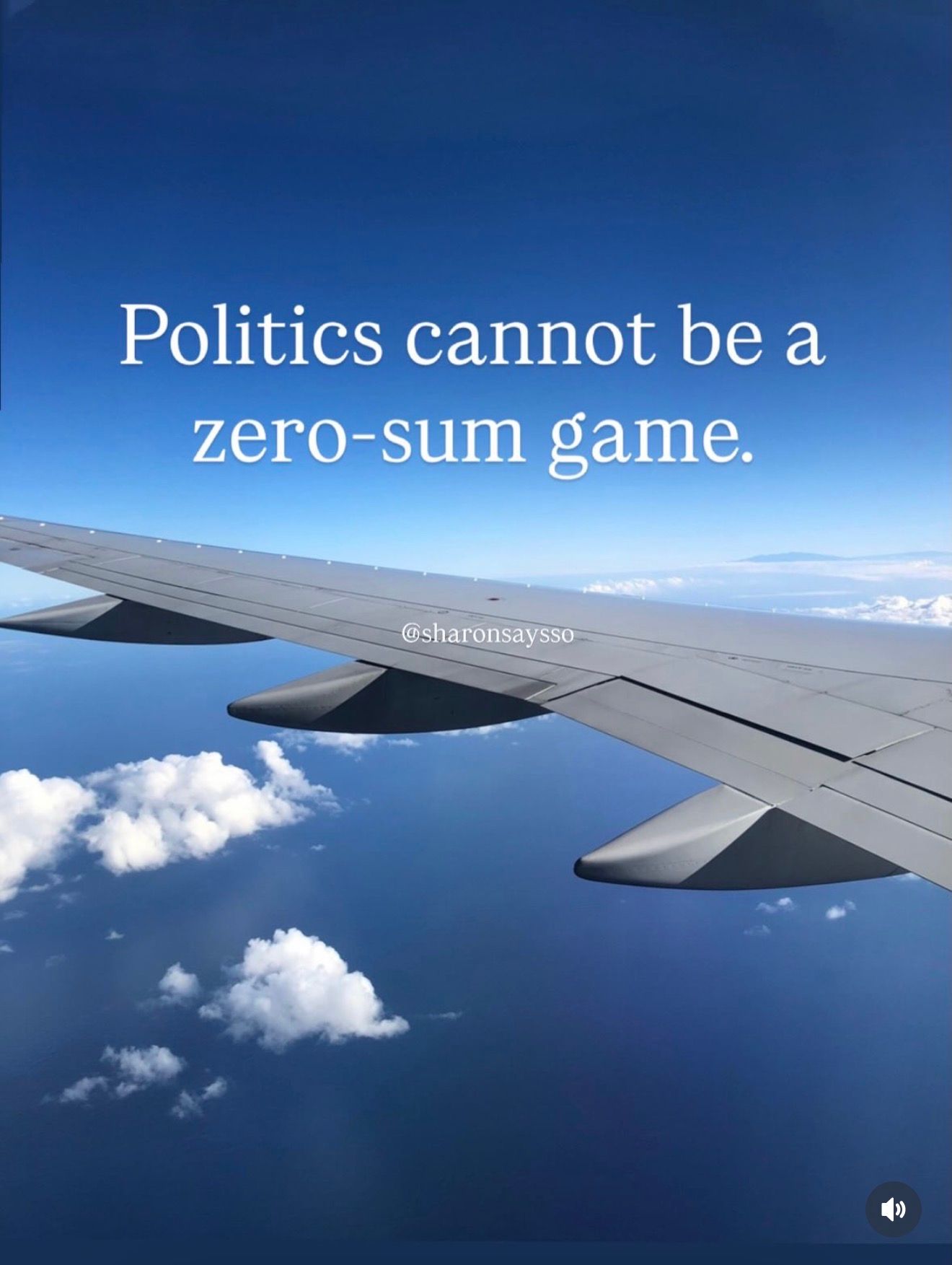 An airplane wing above the clouds, with the words “Politics cannot be a zero-sum game.”