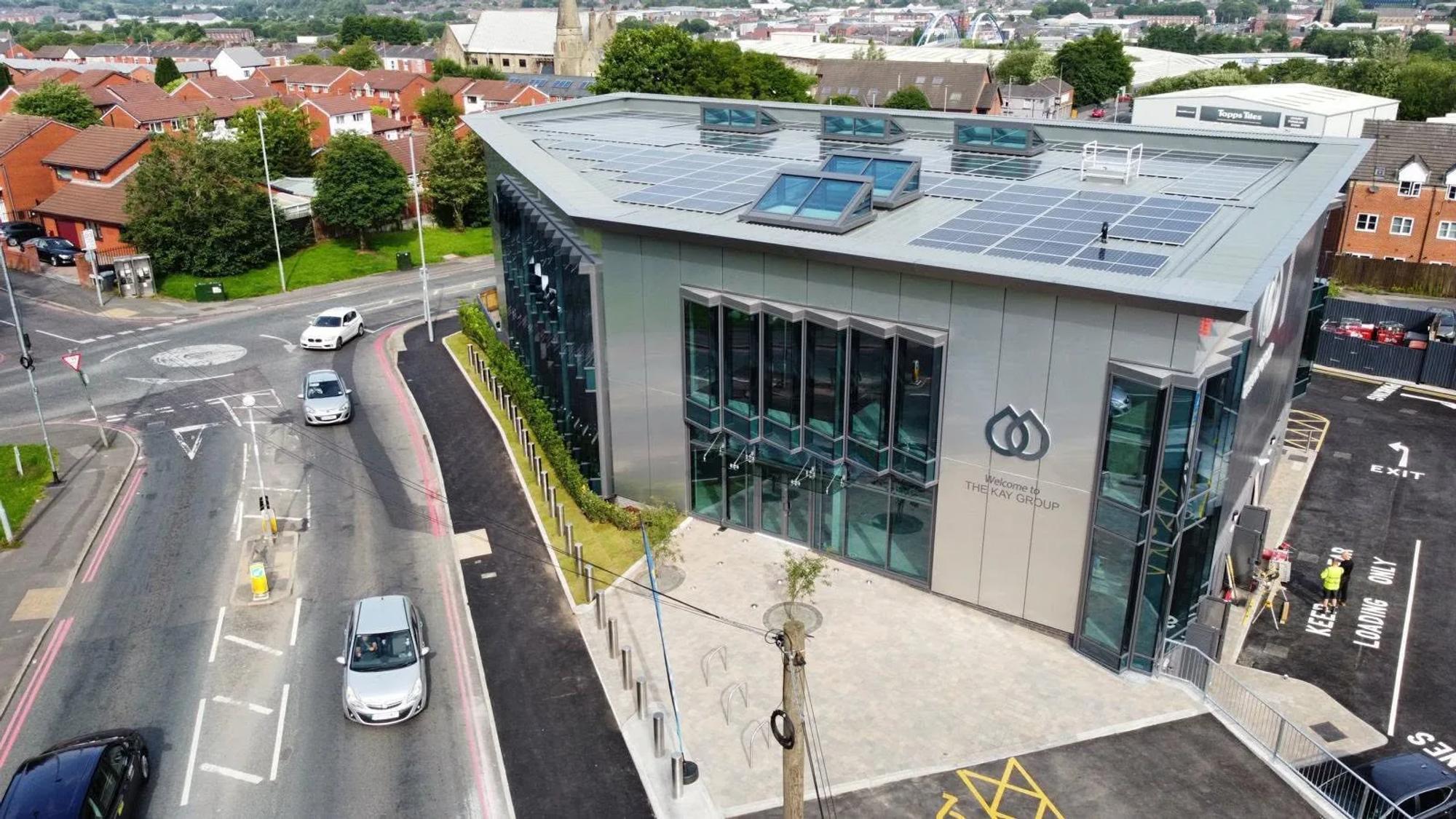 Aerial view of The Kay Group commercial building and its completed glazed façades
