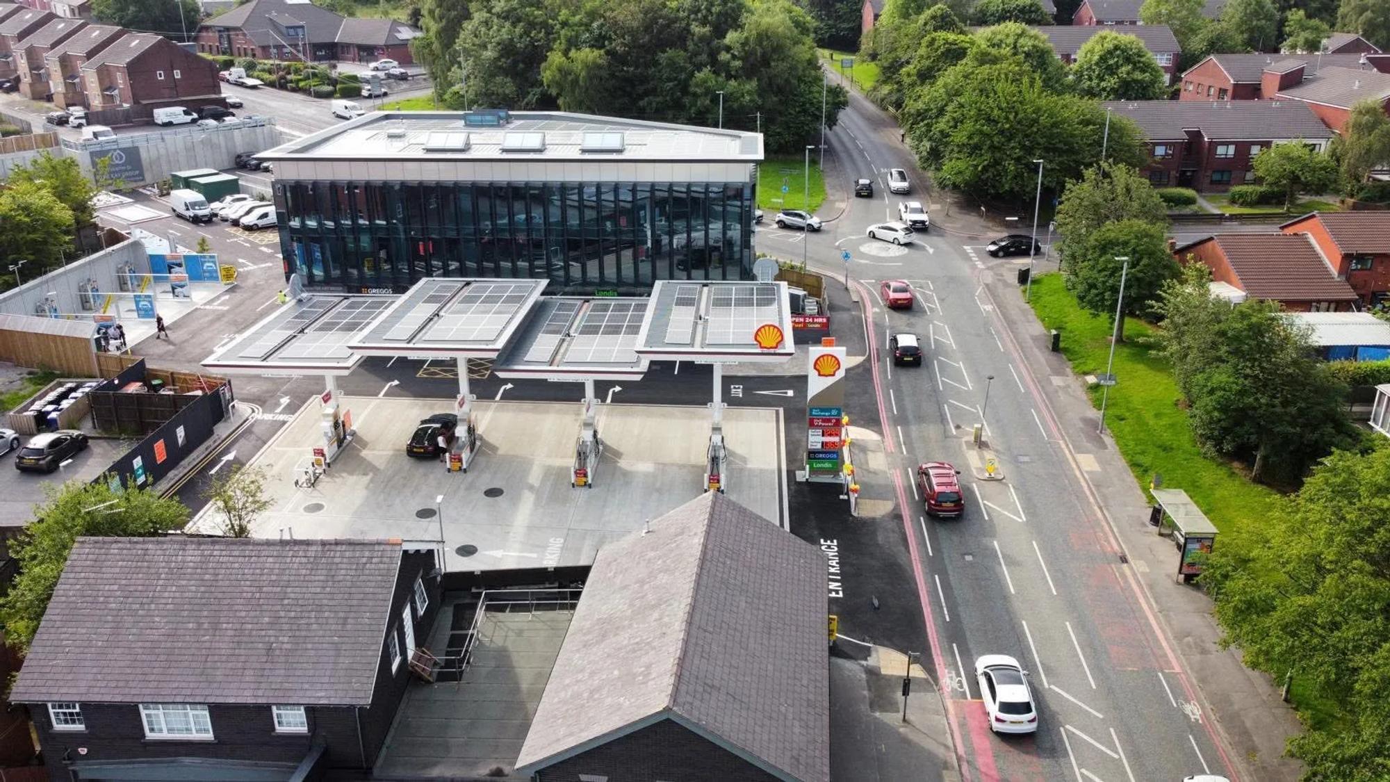 Aerial overview of Kirkshaw Park service station and its glazed commercial building