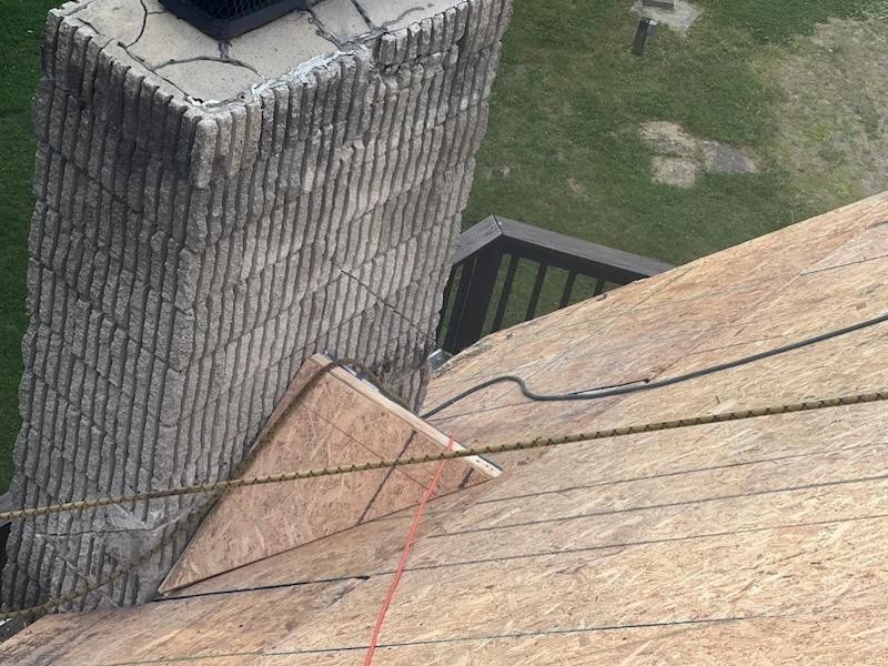 Chimney cricket framed on a roof deck