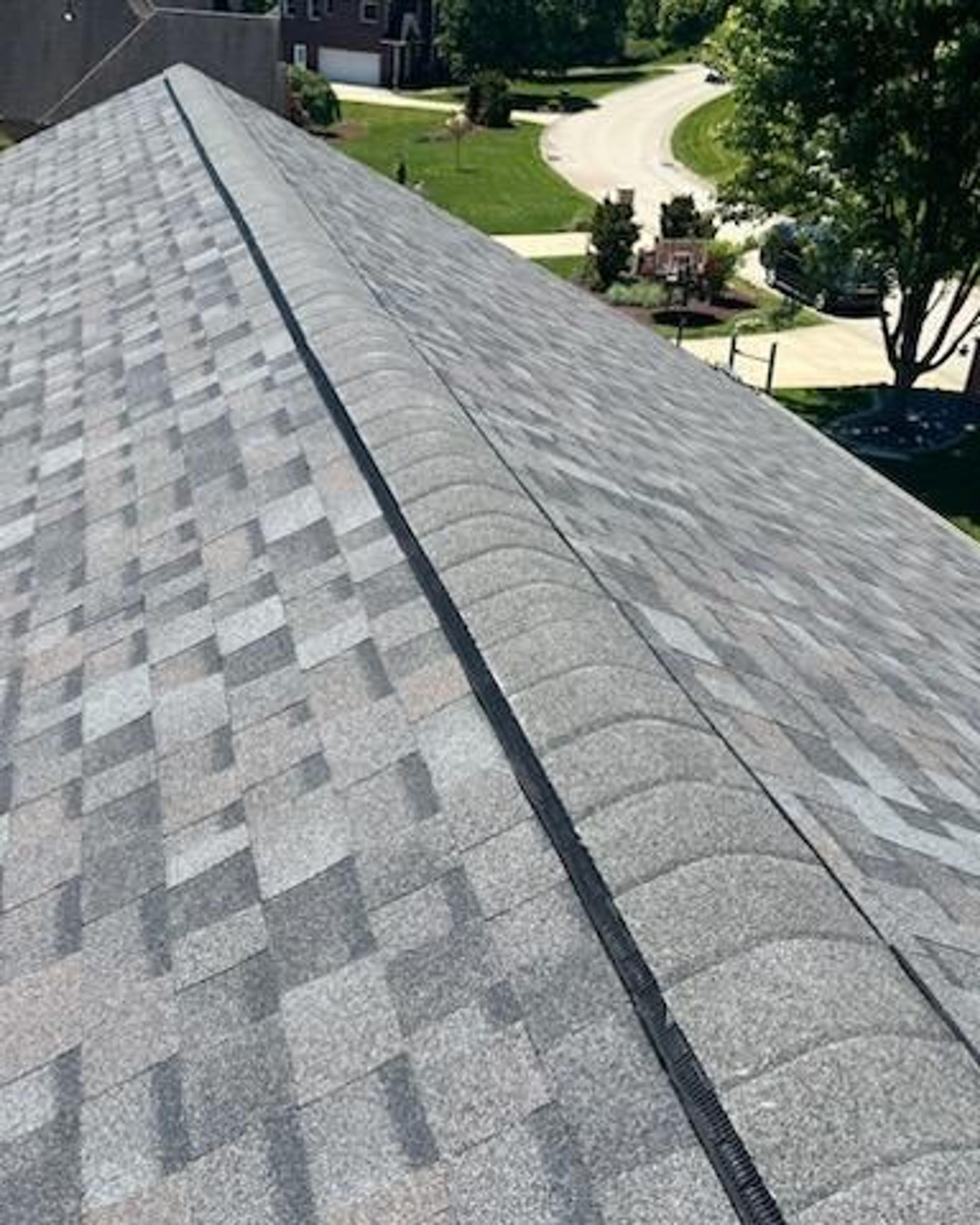 Ridge vent running along a finished roof