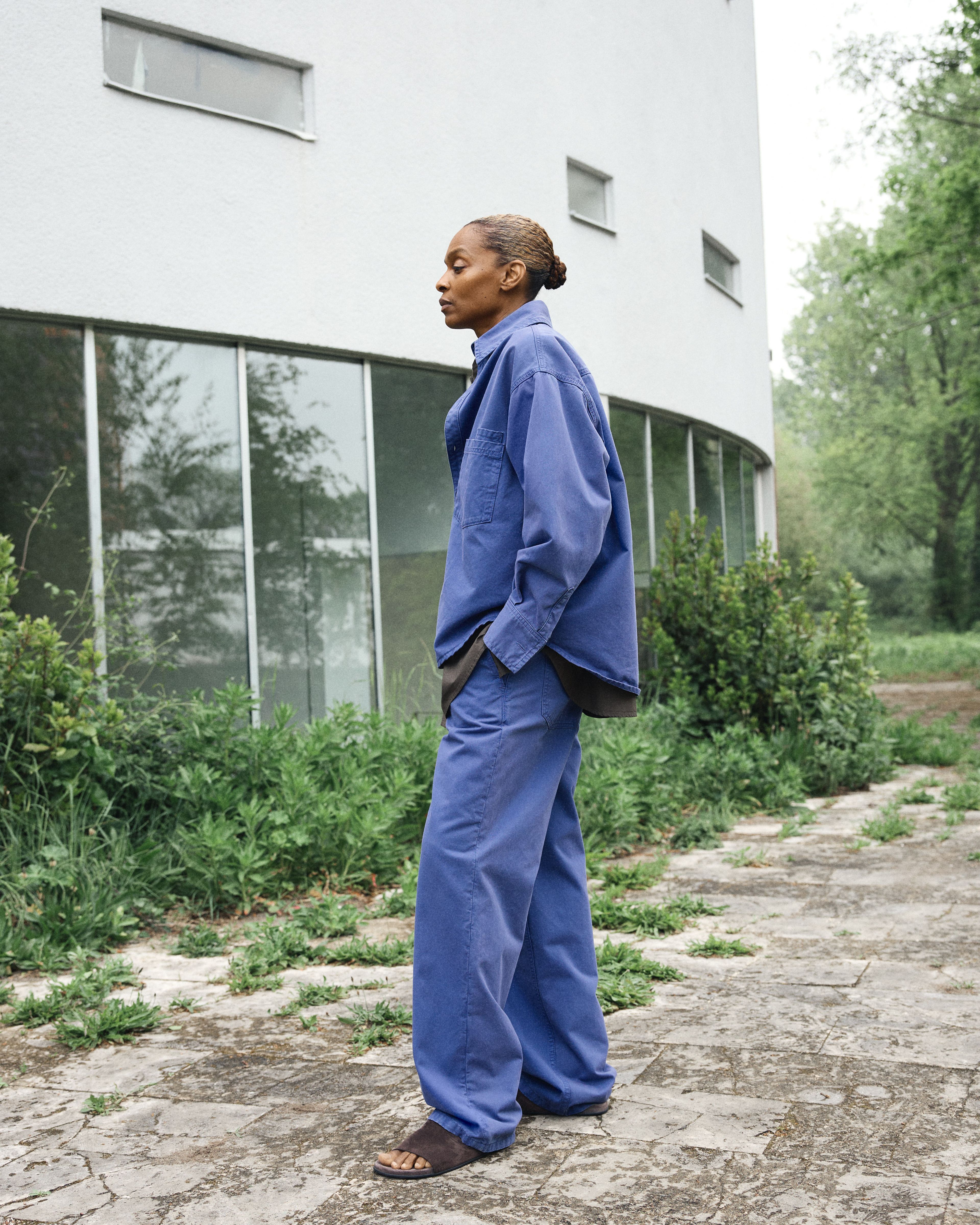 Model outside, blue suit