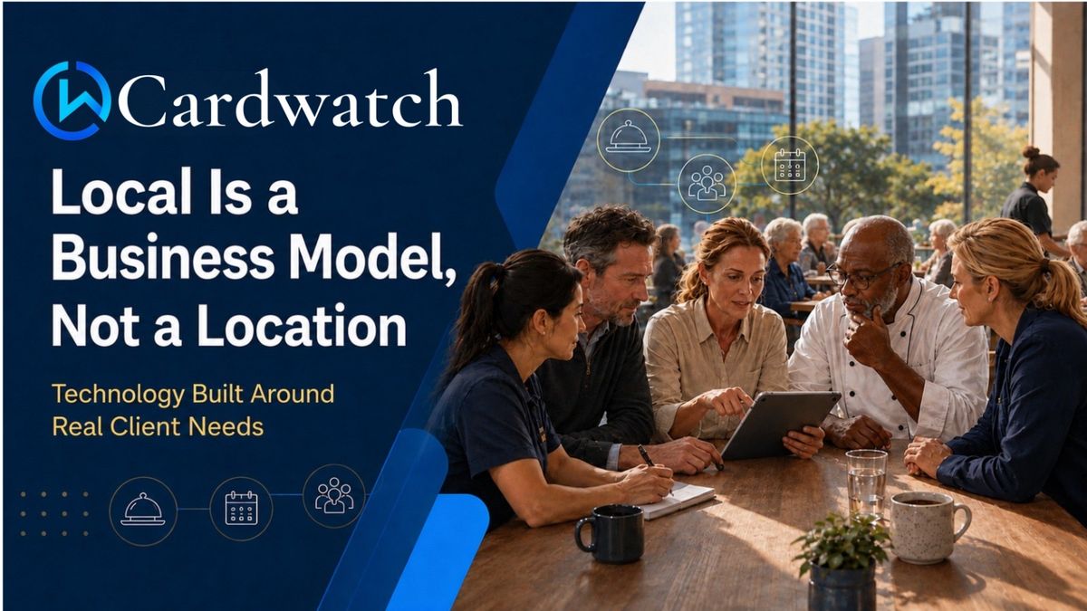 A group of colleagues and clients collaborate around a tablet at a cafe table, illustrating locally rooted client partnership.