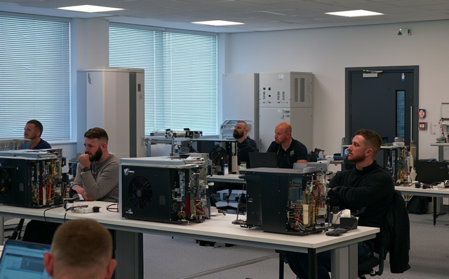 Small classroom setting with engineers and heatpumps