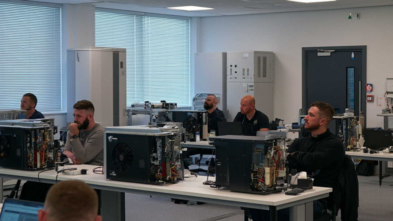 Small classroom setting with engineers and heatpumps