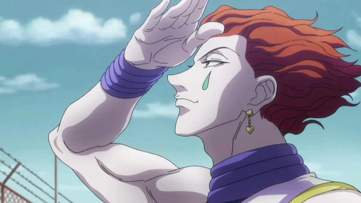 Hisoka from Hunter x Hunter raising a hand to shade his eyes against a blue sky, a teardrop on his cheek