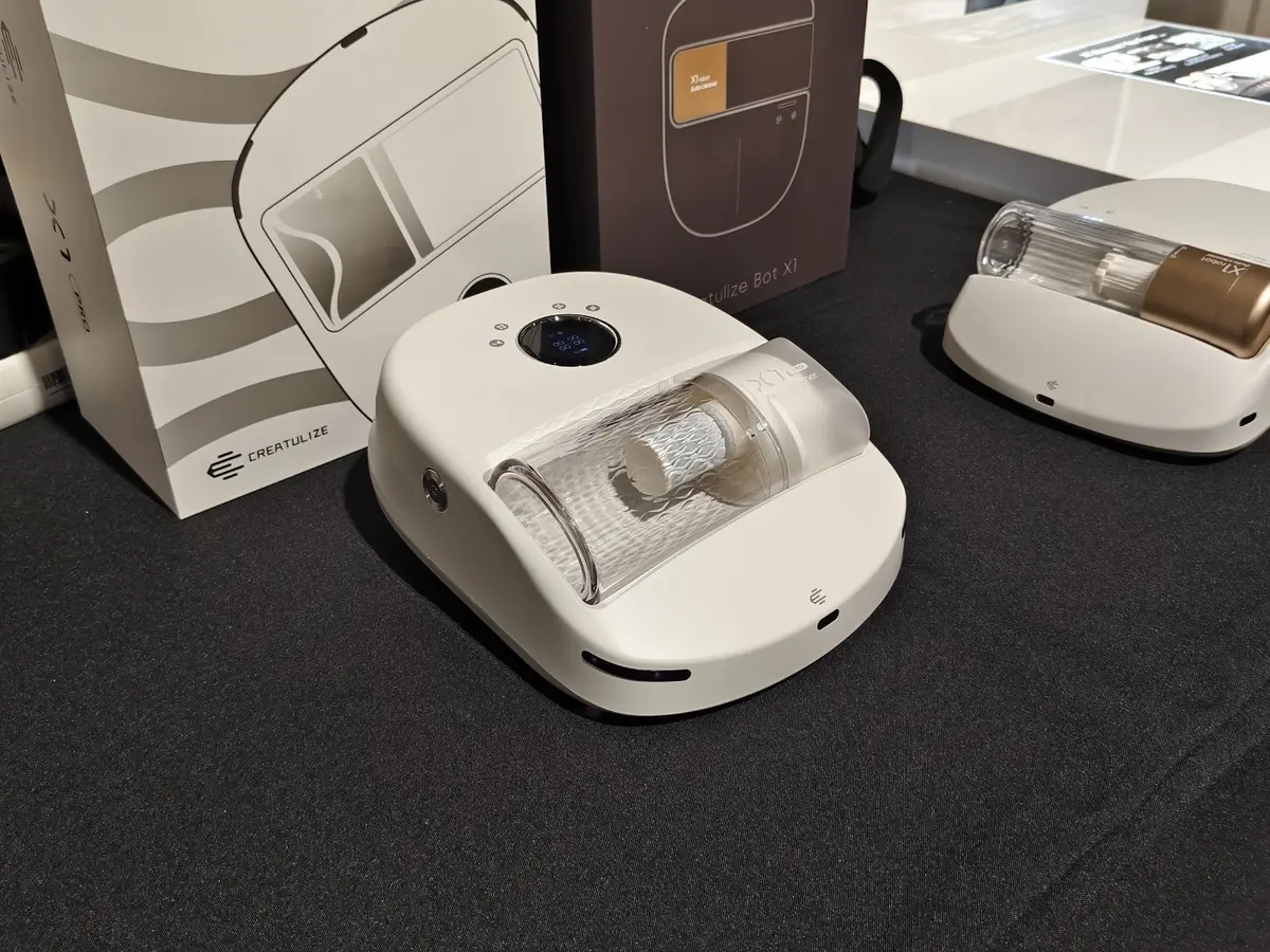 Creatulize X1 Pro mattress-cleaning robot displayed at IFA 2026, with its control panel and dust compartment visible.