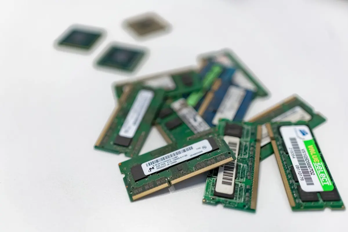 Illustrative photo of memory cards on a white surface, representing high-bandwidth memory production.