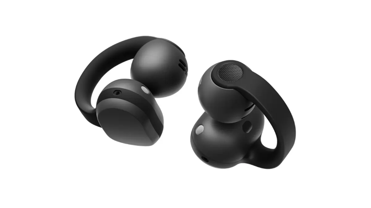Samsung Galaxy Buds On clip-on open-ear earbuds in black, resting on a plain light background.
