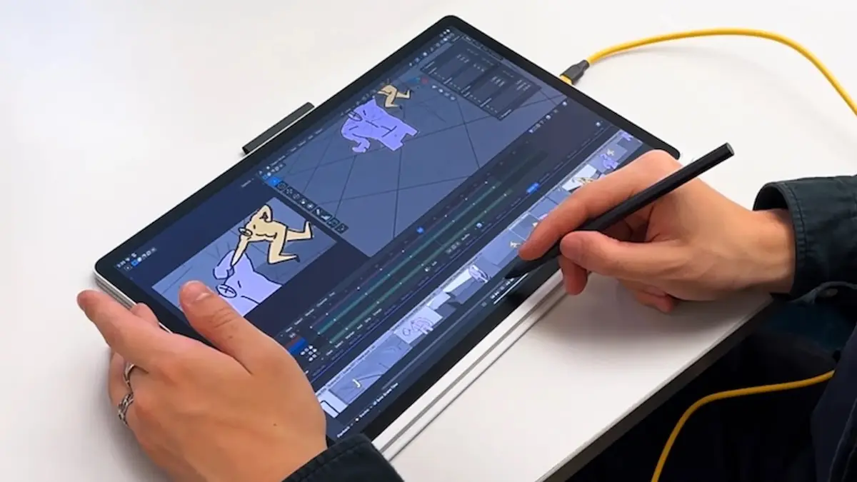 A person drawing with a stylus on a tablet running Blender's editing interface