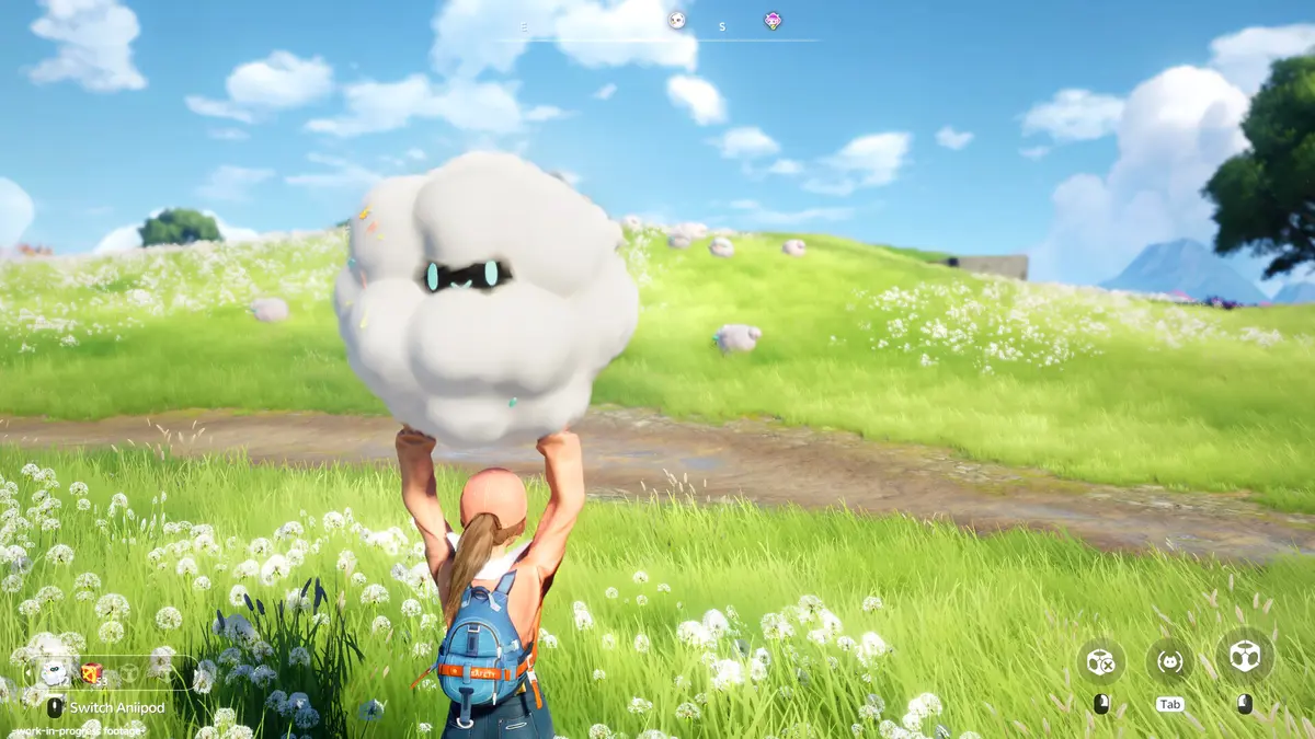 Screenshot from Aniimo showing a colourful open-world landscape with lush grass, floating rock formations and a small creature character standing in the foreground.