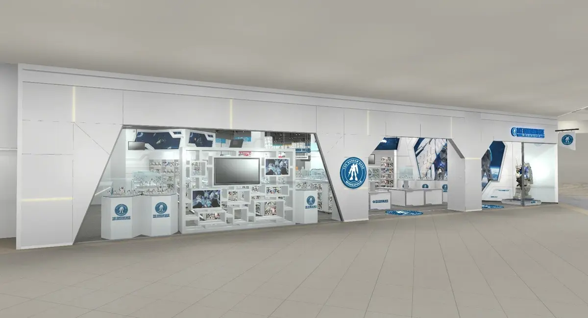 A rendering of THE GUNDAM BASE storefront planned for the Mall of America, showing illuminated display cases of Gunpla model kits and a circular Gundam Base emblem above the shop window.