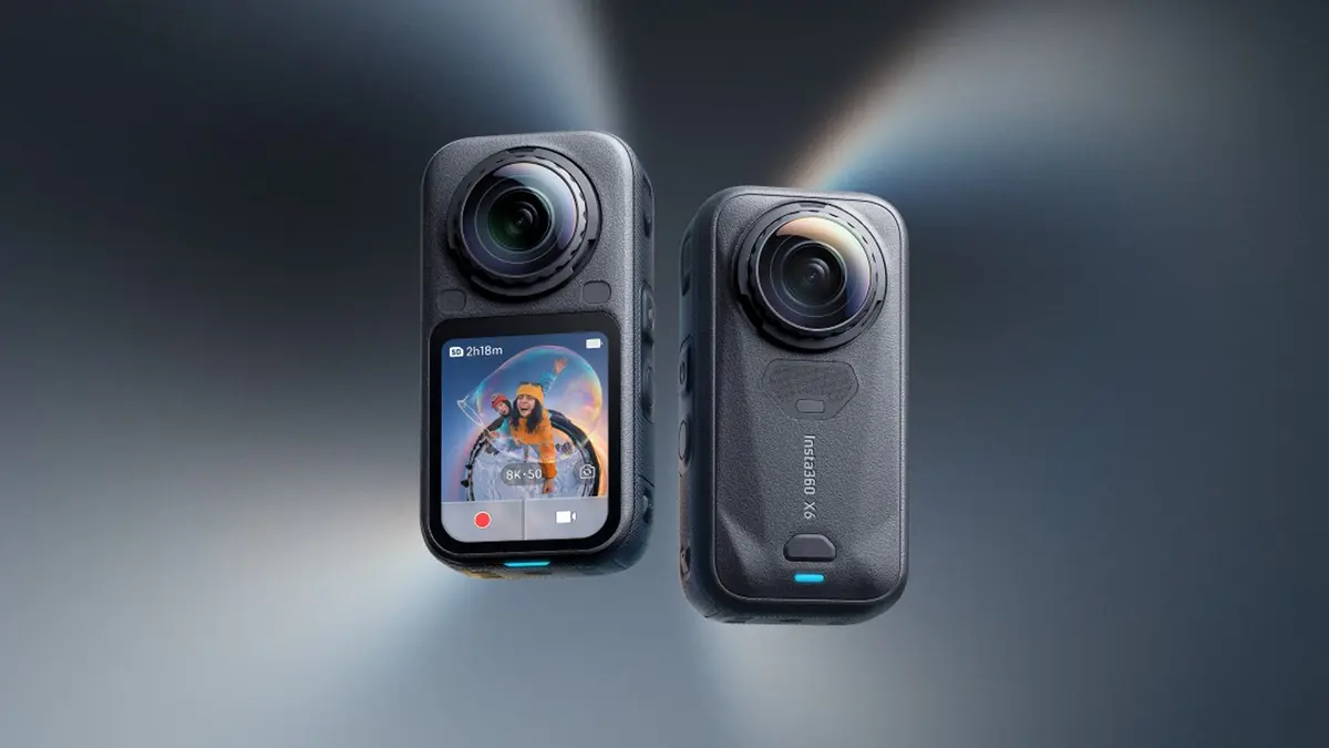 Two Insta360 X6 360-degree cameras photographed against a blue-grey gradient, the front unit showing a live capture preview on its OLED screen
