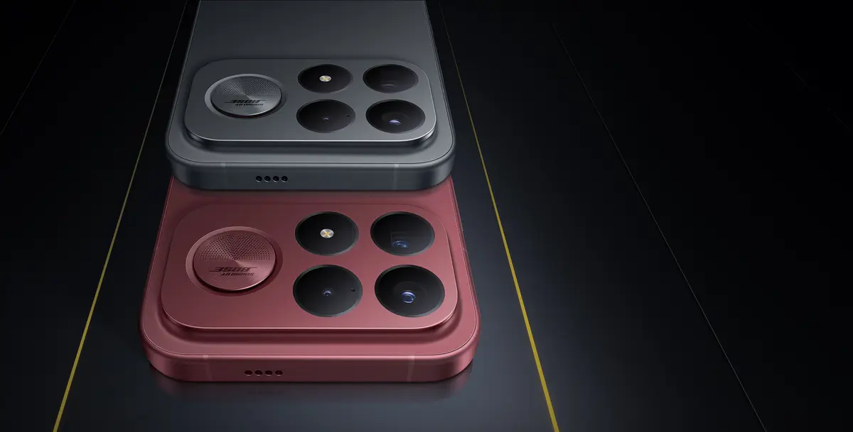 The rear of two POCO F9 Ultra phones, one in dark grey and one in dark red, showing the large four-lens camera island and a circular Bose-branded speaker element.