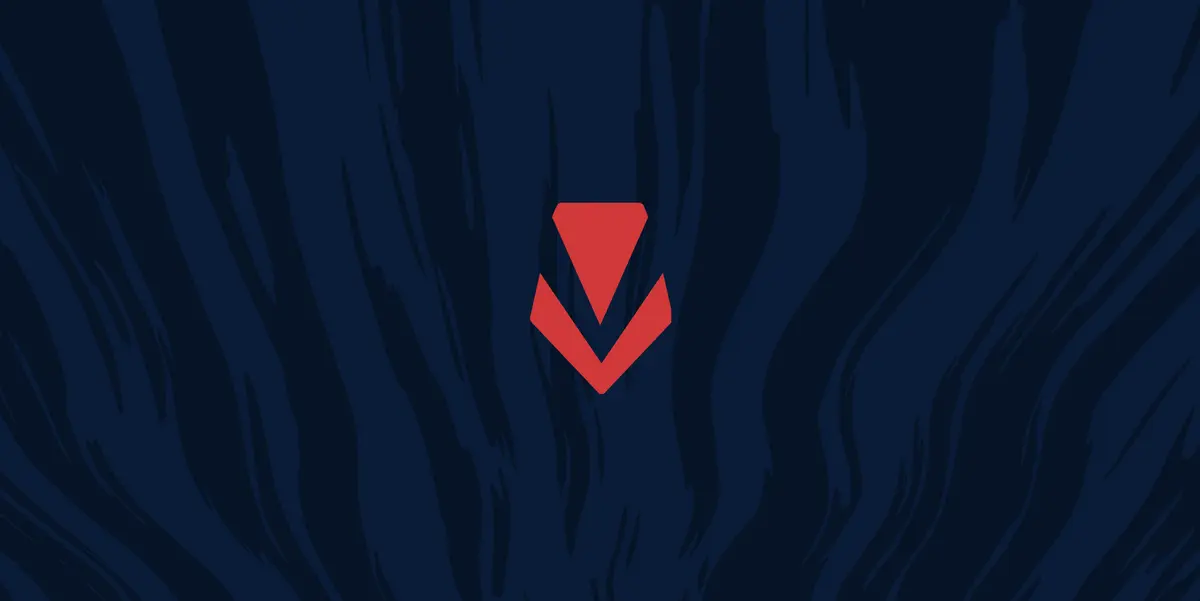 Riot Games' Vanguard artwork: a red chevron logo glowing at the centre of a dark navy background